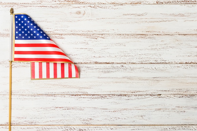 United states of american flag on white wooden desk