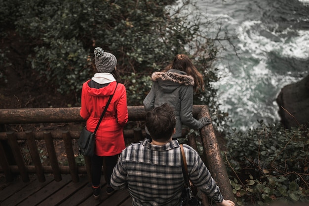 Free photo unrecognizable family enjoying view