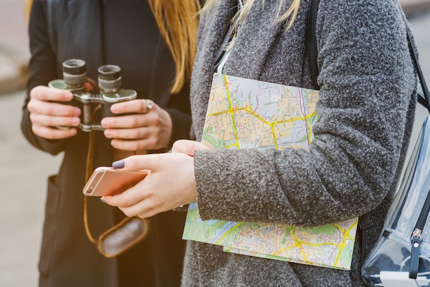 Free Photo unrecognizable female travellers