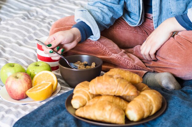 Unrecognizable woman with food