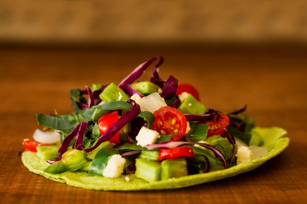 Unwrapped tortilla with fresh vegetables