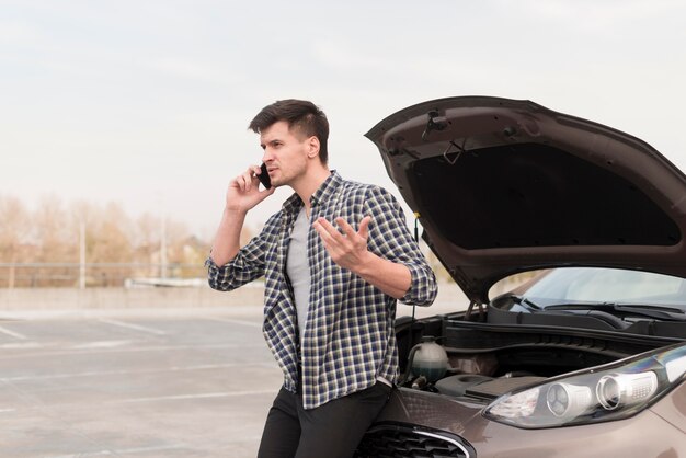 Upset man talking over phone