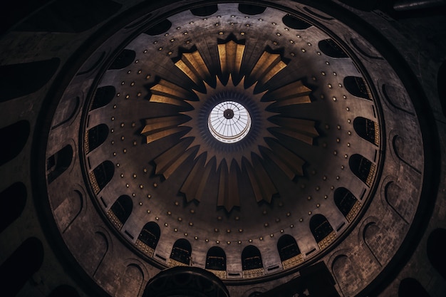 Upshot low angle shot of the ceiling of a church with beautiful architecture