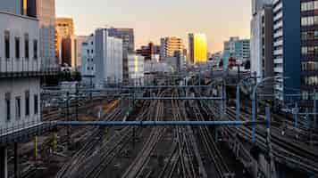 Free photo urban landscape japan trails and sunset