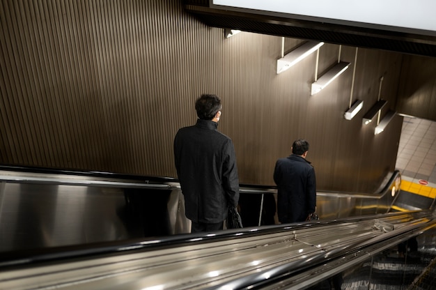 Urban landscape of tokyo city with escalators