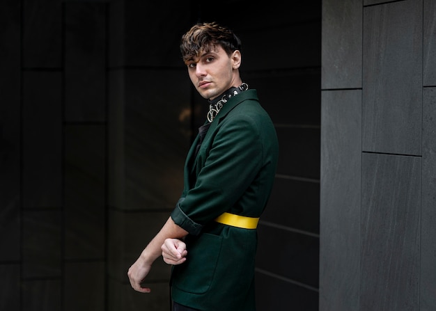 Free photo urban portrait of non binary person in green jacket