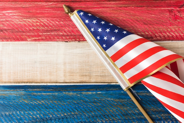 Free Photo usa flag on blue and red painted wooden plank