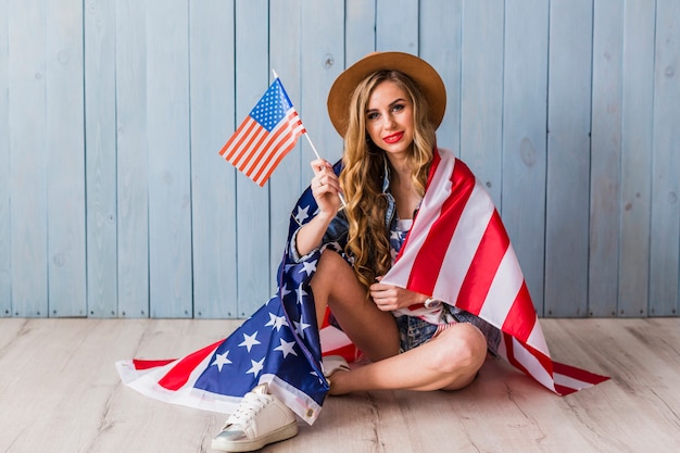 Usa independence day concept with sitting woman