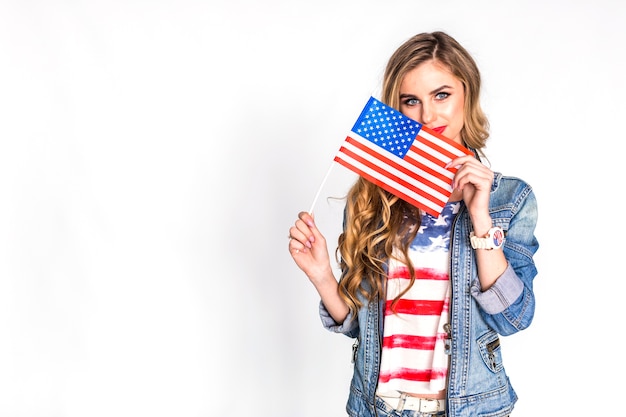 Usa independence day concept with woman showing flag