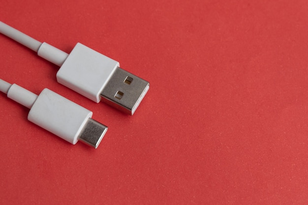 USB cable type C over red background