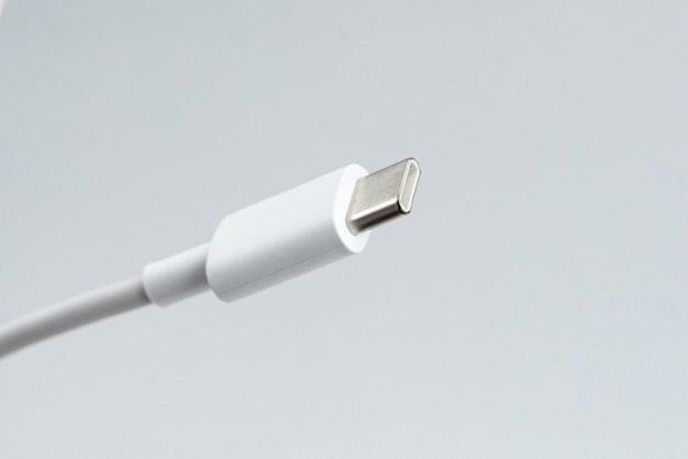 USB cable type C over white isolated background