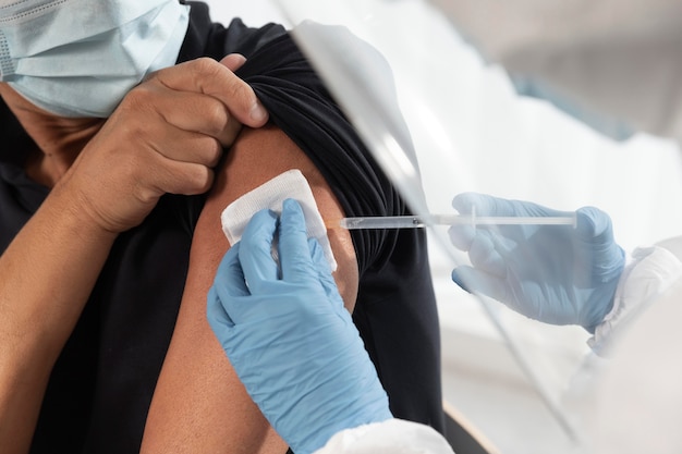 Vaccination center with doctor and patient