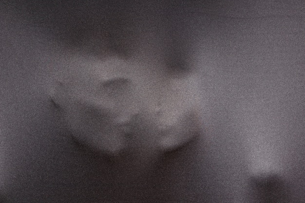 Vague silhouettes of human faces