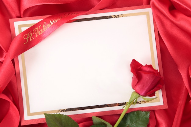 Valentine card on red silk