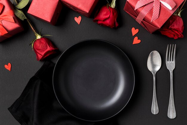 Valentine's day table set with roses and plate