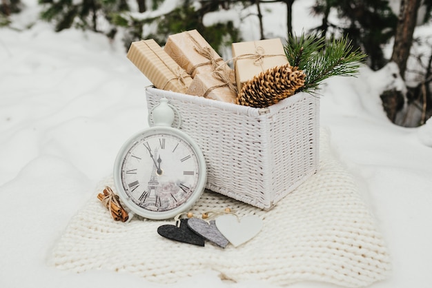 Free Photo  valentines gifts. present gifts boxes piled in a white wicker basket 