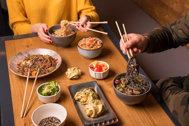 Variety of asian food on table