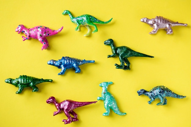 Free photo various animal toy figures in a colorful background