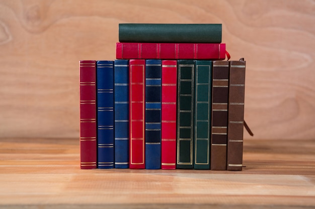 Various books arranged on a table