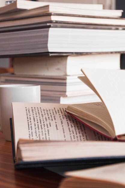 Various books near mug