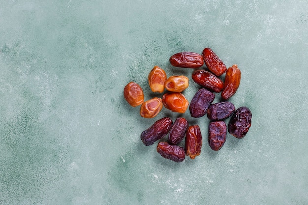 Free photo various of dried dates or kurma.