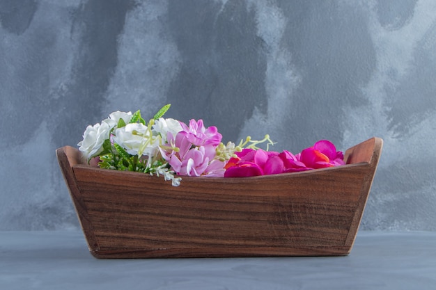 Free Photo various flowers in a box, on the white background.