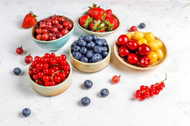 Various fresh summer berries,blueberries,red currant,top view.