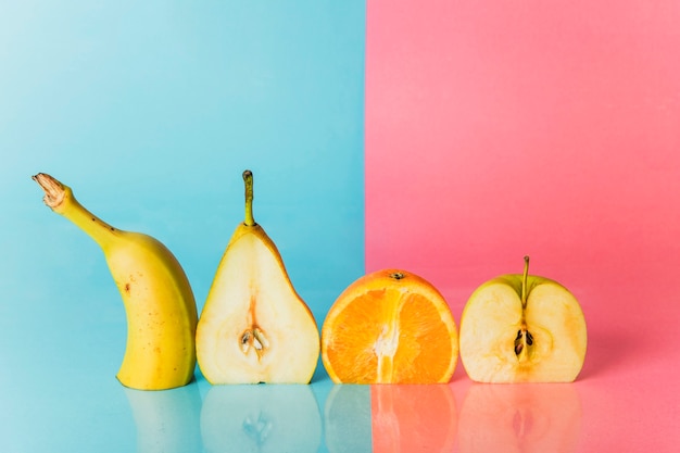 Free Photo various fruits cut in half