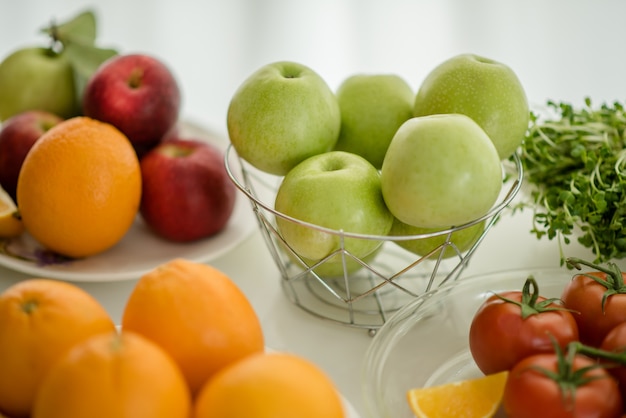 Various fruits with vegetable on wood background