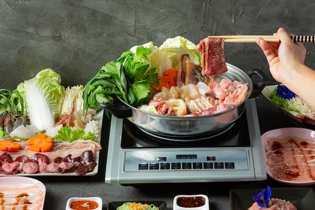 Various ingredients of shabu hot pot with sauce