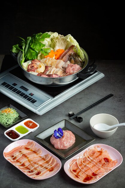 Various ingredients of shabu hot pot with sauce