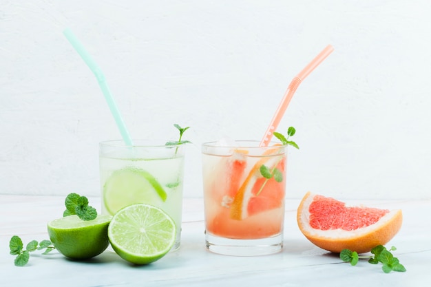 Free photo various refreshing citrus beverages