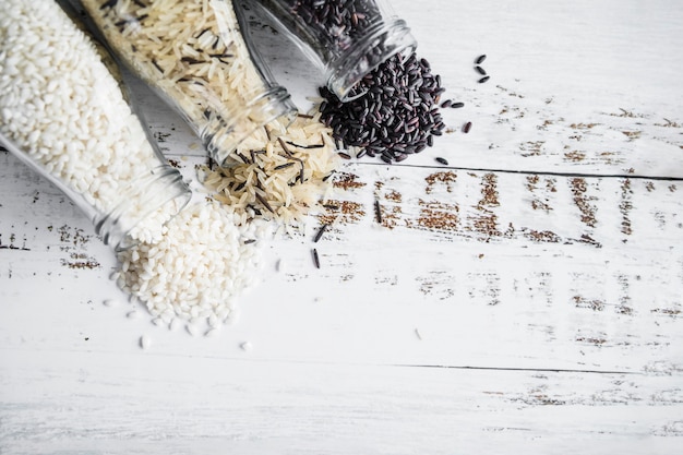 Various rice scattered from bottles