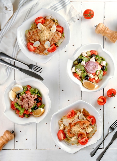 Various salads on the table top view