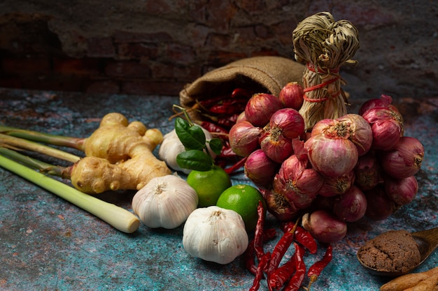 Various spices and herbs for cooking on black