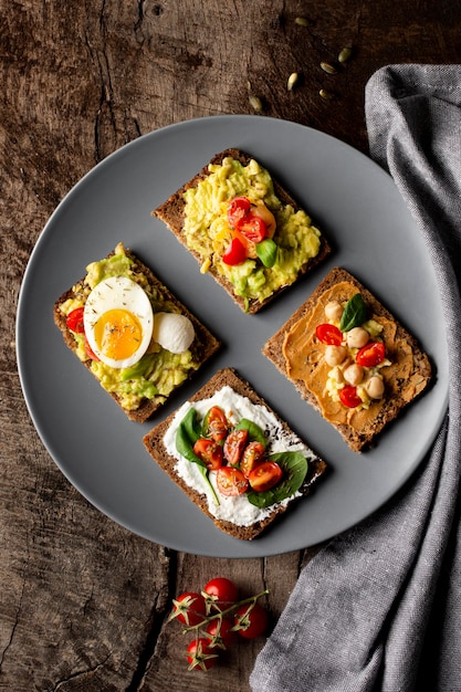 Various toasts with veggie cream with cloth