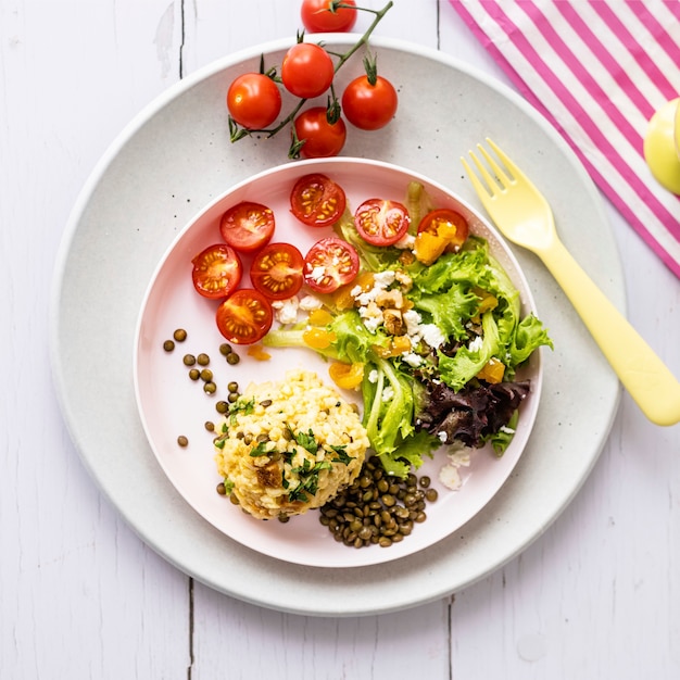 Free Photo vegan lunch for kids, pumpkin risotto with lentils