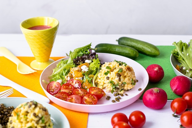 Vegan lunch for kids, pumpkin risotto with lentils