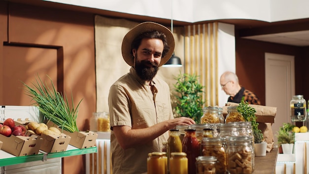 Free Photo vegan man in specialty food supermarket