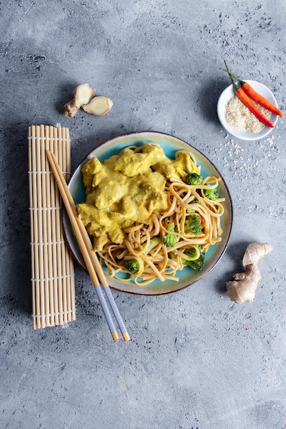 Vegan noodles with chicken and vegetables