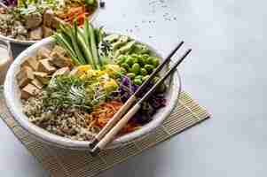 Free photo vegan poke bowl with marinated tofu photography