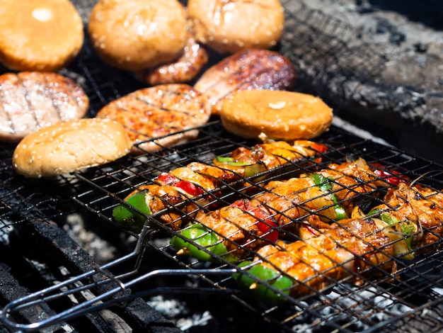 Free photo vegetable and meat frying on coal