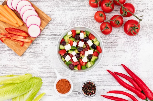 vegetable salad plate surrounded with other vegetables