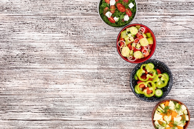 vegetable salads with copy space on the left white wooden table