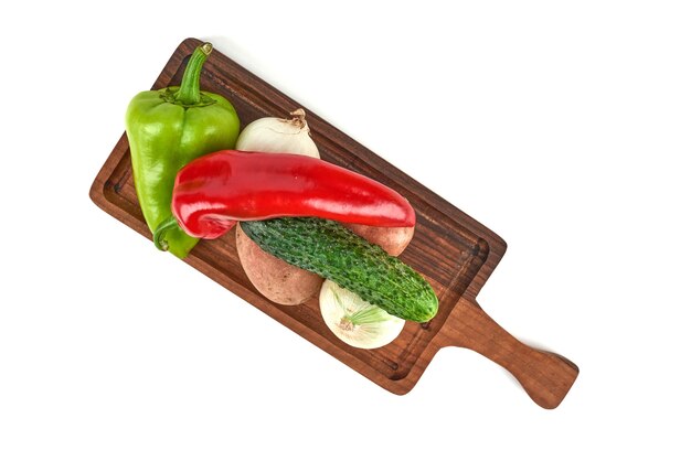 Vegetable varieties on a wooden platter.