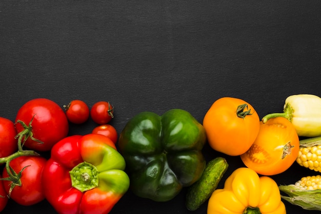 Free Photo vegetables assortment on dark background with copy space