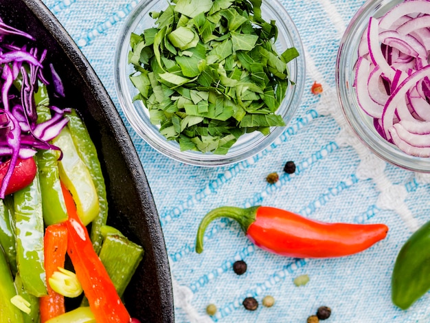 Free Photo vegetables in cups and chili