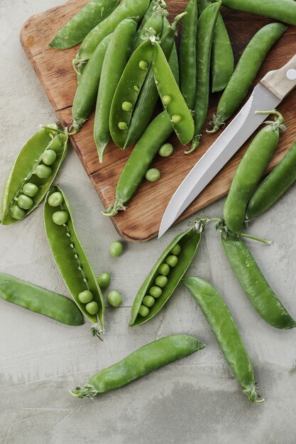 Vegetables. Green peas on the table