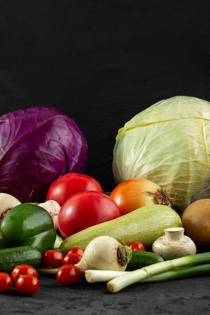 Vegetables ripe colored vegetables on grey desk