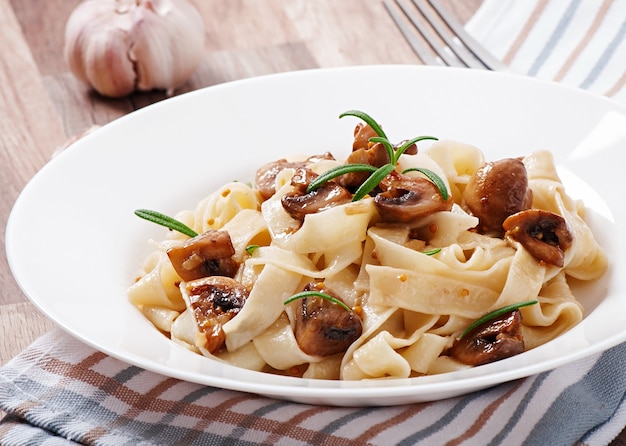 Vegetarian dish with tagliatelle and mushrooms